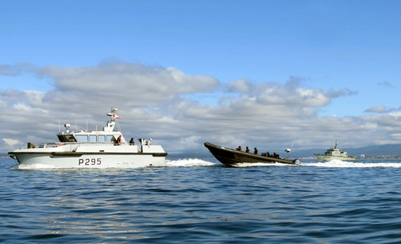 A Portuguese RIB approaches HMS Cutlass